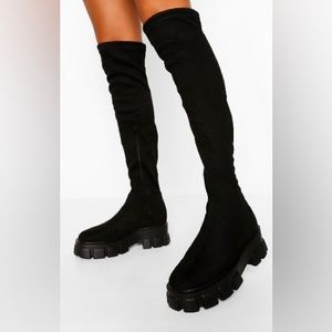 Black knee high chunky sole stretch over knee boots